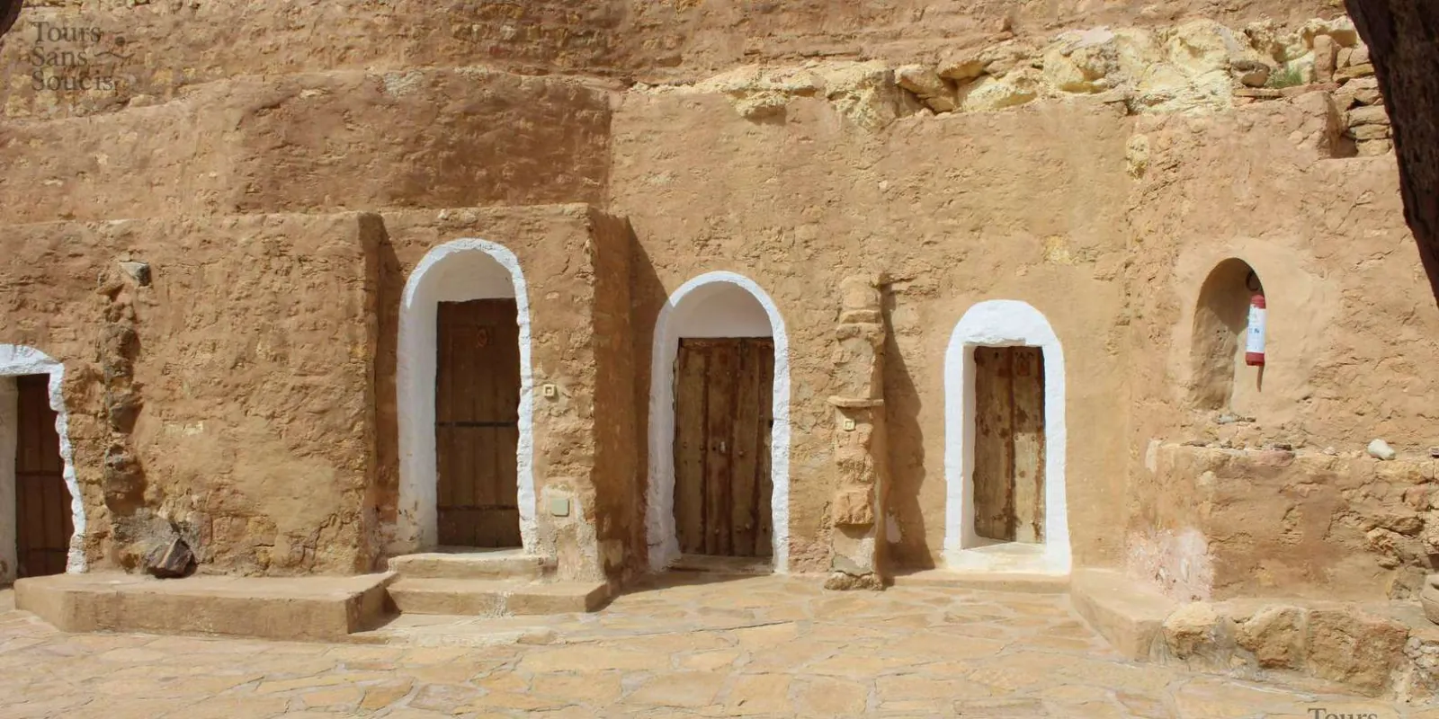 Arched doorways of a Berber cave dwelling in the Dahar